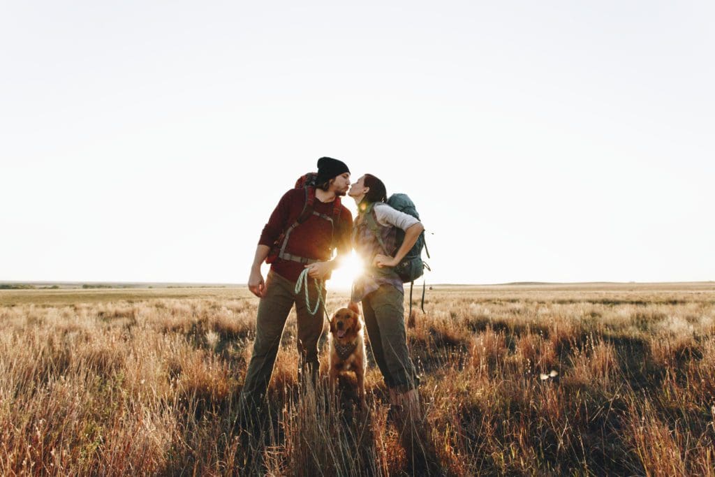 couple hiking with dog wilderness travel with dog ideas tips and tricks camping with dog